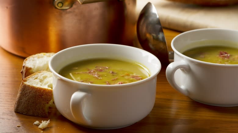 Mug with broth and bread