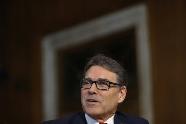 US Energy Secretary Rick Perry said he would not advise President Trump to abandon the Paris climate deal, but to "renegotiate it"