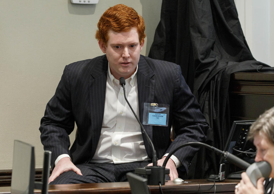 Buster Murdaugh, the son of Alex Murdaugh, testifies during his father's trial at the Colleton County Courthouse in Walterboro, S.C., on Tuesday, Feb. 21, 2023. The 54-year-old attorney is standing trial on two counts of murder in the shootings of his wife and son at their Colleton County, S.C., home and hunting lodge on June 7, 2021. (Grace Beahm Alford/The Post And Courier via AP, Pool)