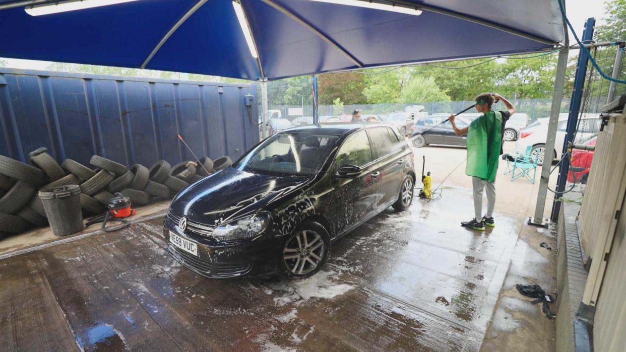 Pictured: Harvey washing cars