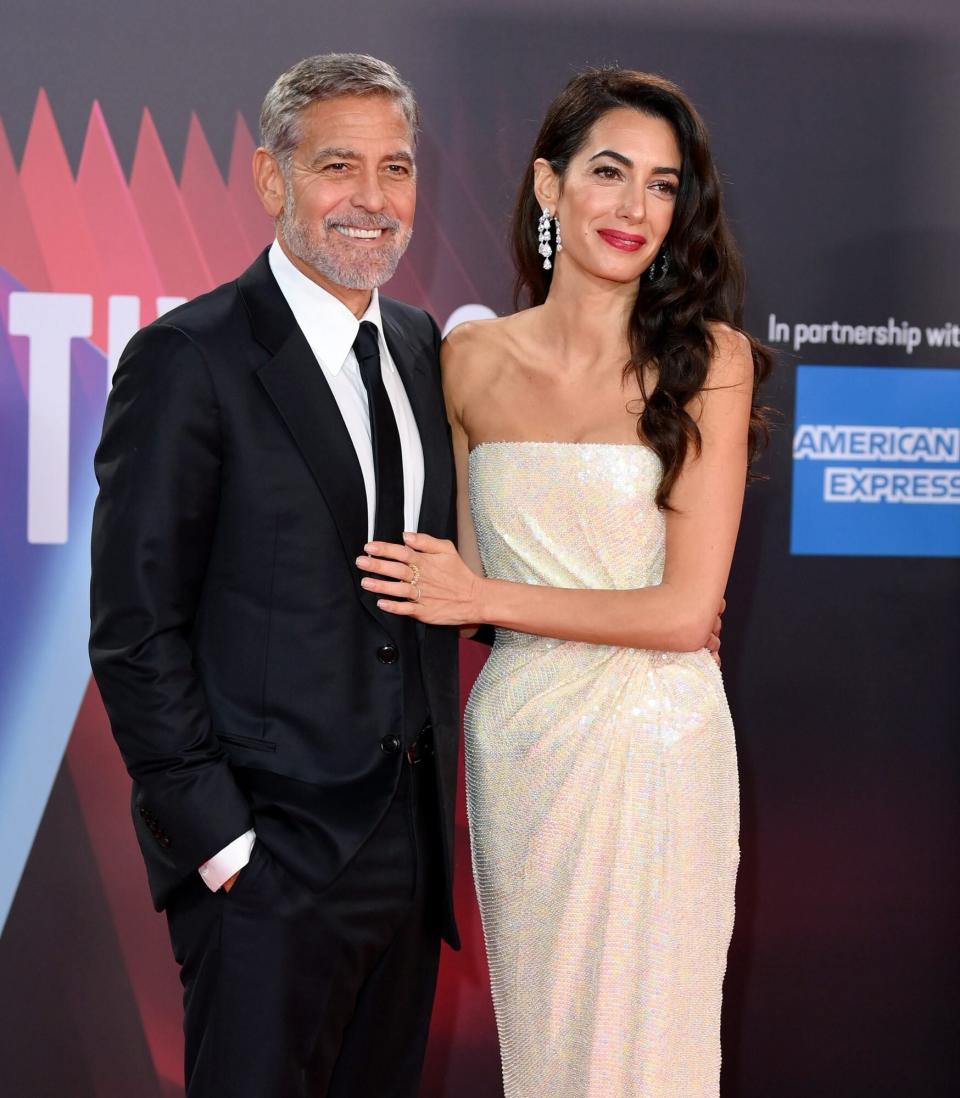 George Clooney and Amal Clooney attend "The Tender Bar" Premiere during the 65th BFI London Film Festival at The Royal Festival Hall on October 10, 2021