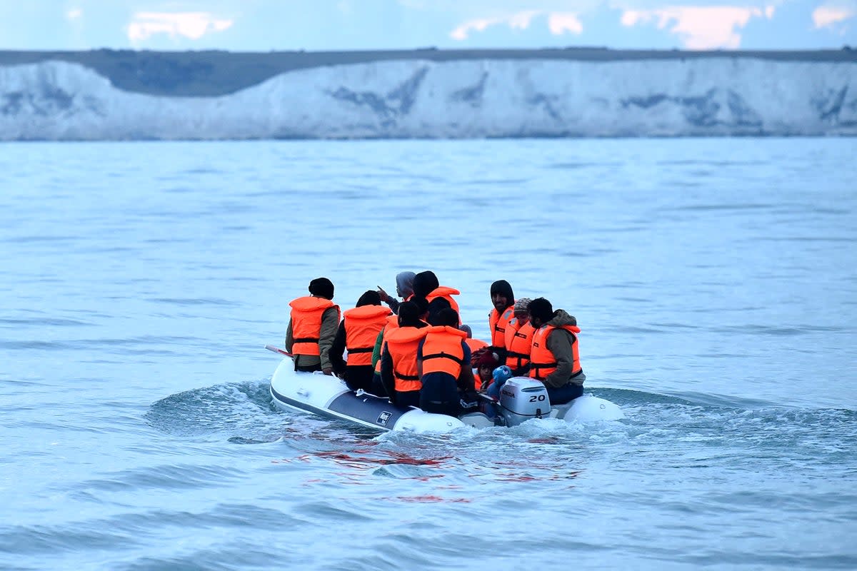 Migrants in a dinghy sail in the Channel (AFP/Getty)