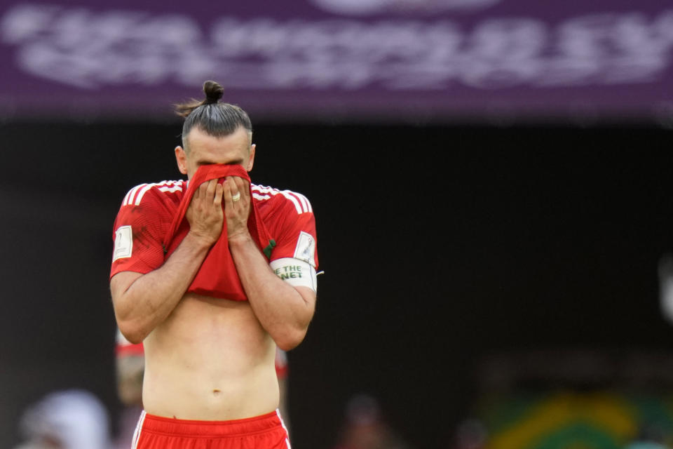 Wales' Gareth Bale reacts at the end of the World Cup group B soccer match between Wales and Iran, at the Ahmad Bin Ali Stadium in Al Rayyan, Qatar, Friday, Nov. 25, 2022. (AP Photo/Alessandra Tarantino)