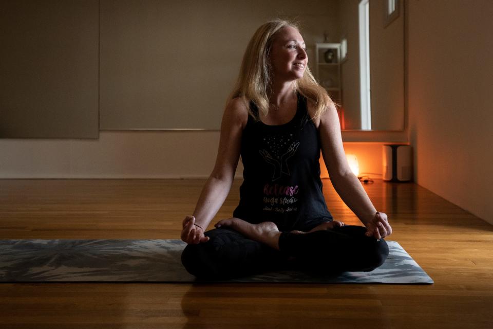 Lisa Cleaver, the owner of Release Yoga Studio in Hillsdale, is shown on Wednesday, June 14, 2023. 