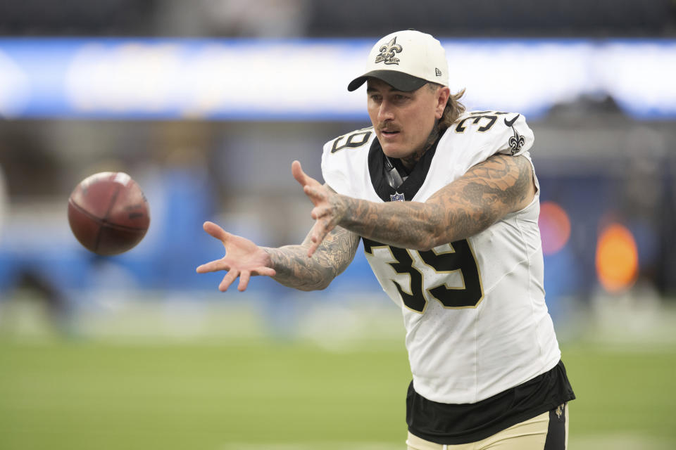 New Orleans Saints punter Lou Hedley (39) warms up before an NFL preseason football game against the Los Angeles Chargers, Sunday, Aug. 20, 2023, in Inglewood, Calif. (AP Photo/Kyusung Gong)