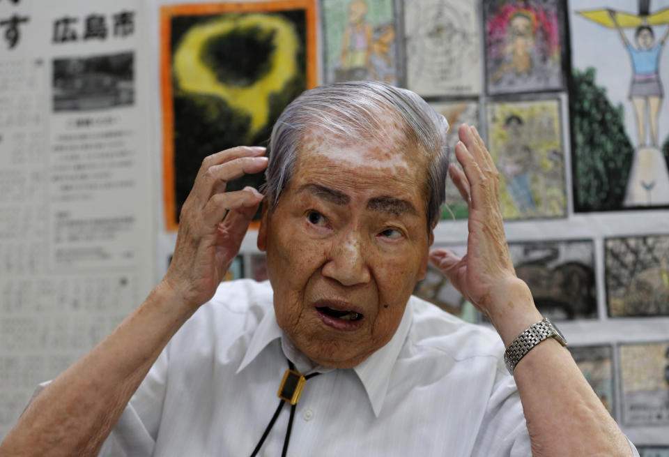 FILE - In this Aug. 28, 2013, file photo, Sunao Tsuboi, then co-chairperson of Japan Confederation of A-and H-Bomb Sufferers Organizations speaks during an interview at his office in Hiroshima, western Japan. Tsuboi, a survivor of the Hiroshima atomic bombing, who made opposing nuclear weapons the message of his life, including in a meeting with then President Barack Obama in 2016, has died. He was 96. (AP Photo/Shizuo Kambayashi, File)