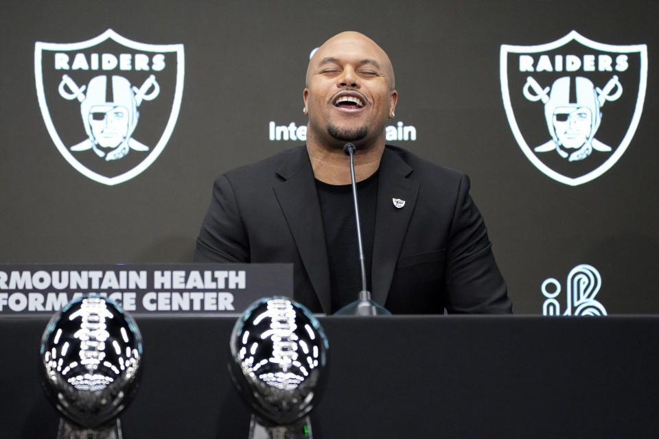 Las Vegas Raiders head coach Antonio Pierce chants at a news conference Wednesday, Jan. 24, 2024, in Henderson, Nev. (AP Photo/John Locher)