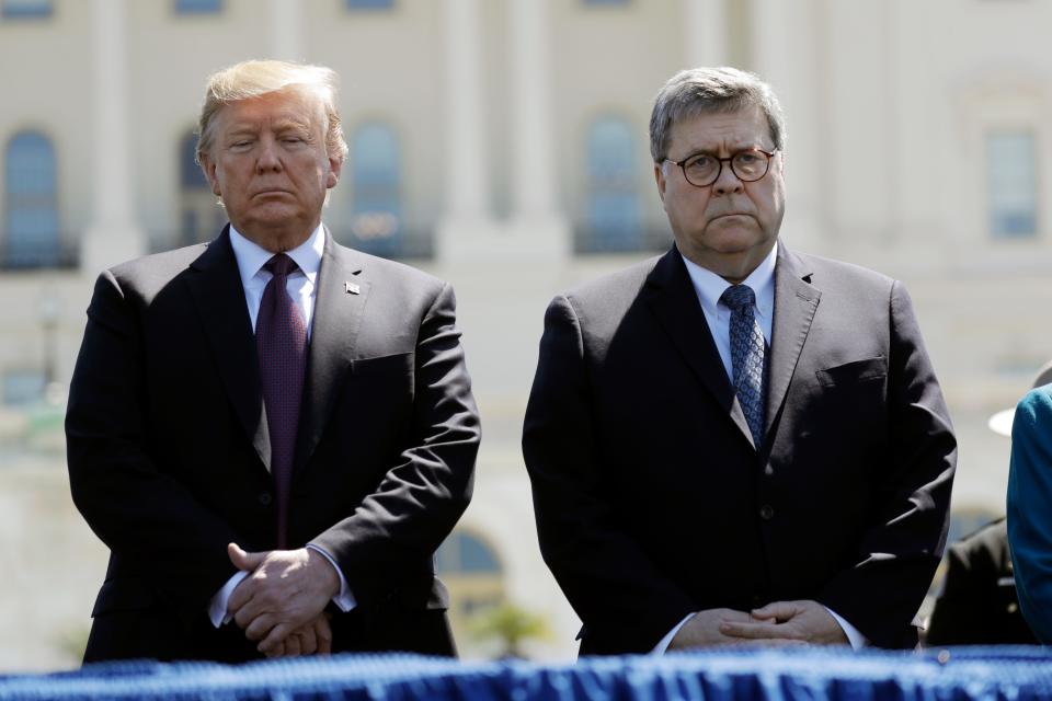 President Donald Trump and Attorney General William Barr attend the 38th Annual National Peace Officers' Memorial Service at the U.S. Capitol, May 15, 2019, in Washington.