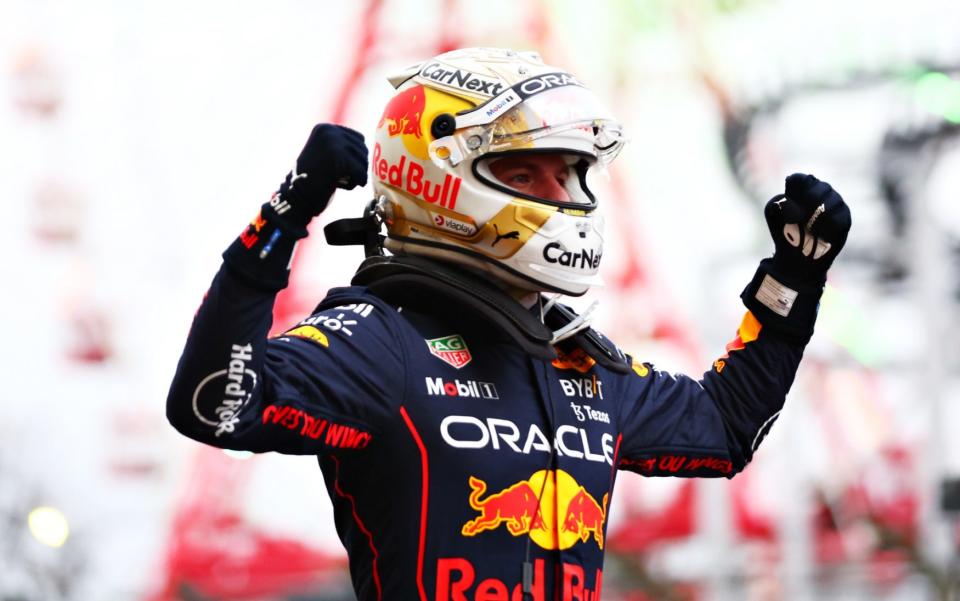 Race winner and 2022 F1 World Drivers Champion Max Verstappen of Netherlands and Oracle Red Bull Racing celebrates in parc ferme during the F1 Grand Prix of Japan at Suzuka International Racing Course on October 09, 2022 in Suzuka, Japan - Getty Images