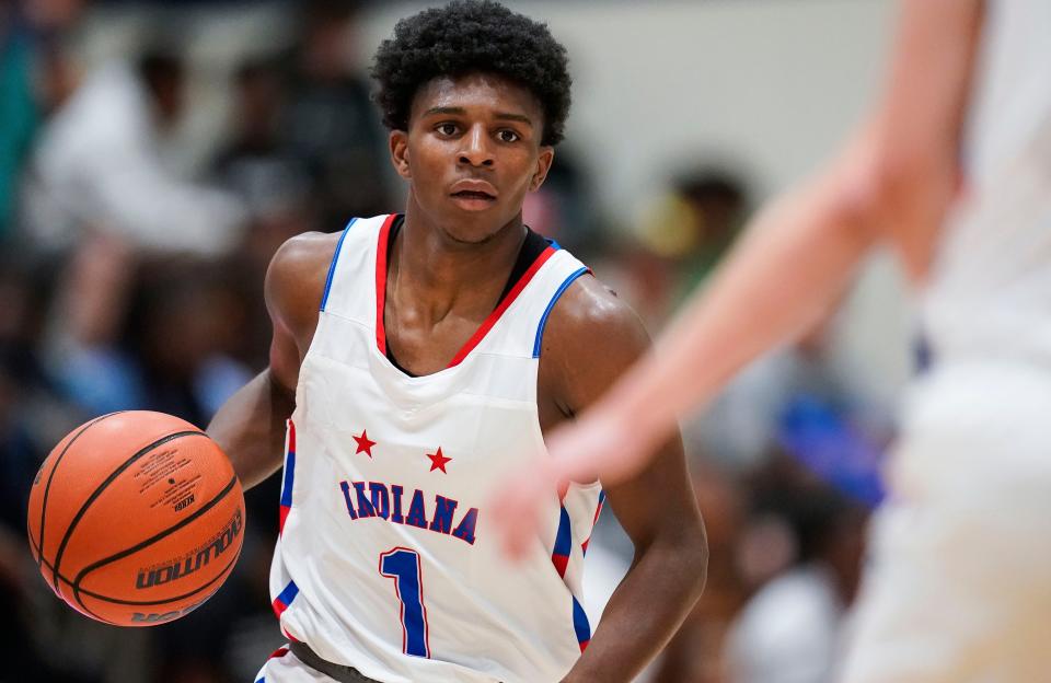 Indiana All-Star Markus Burton (1) rushes up the court Wednesday, June 7, 2023, during the Indiana All-Stars vs. Juniors boys game at Cathedral High School in Indianapolis.