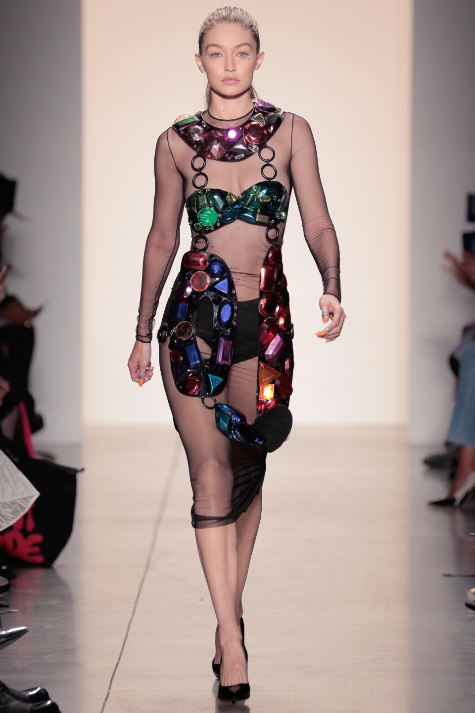 <p>The model rocked a jewel-embellished sheer dress at Jeremy Scott.</p>