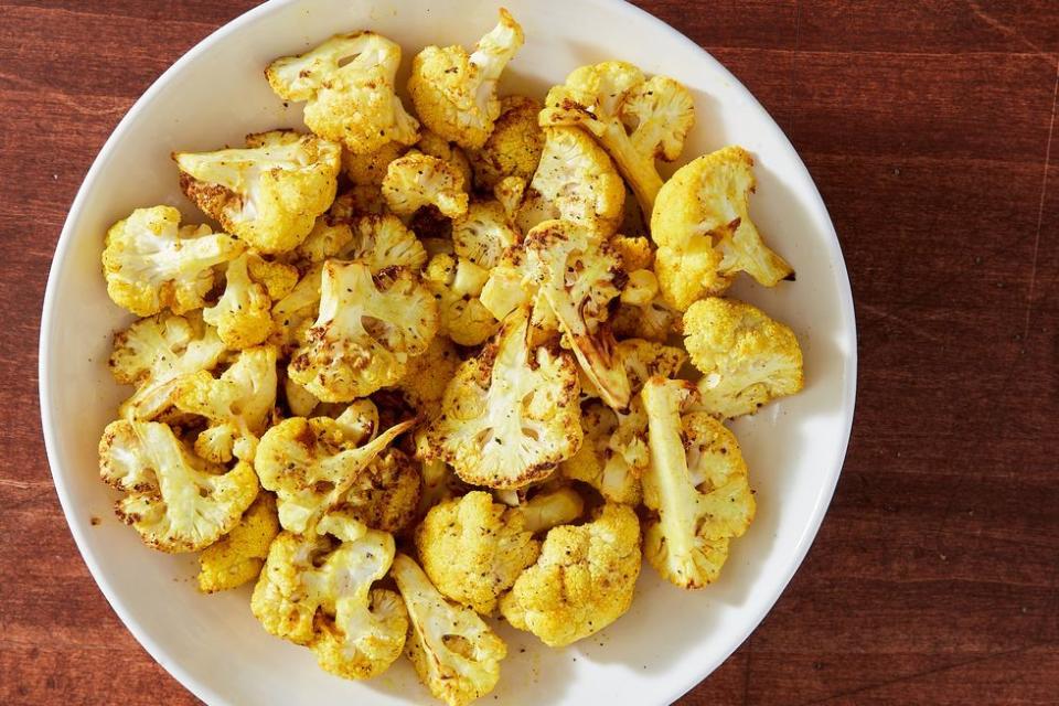 <p>This recipe is simple, fast, and will give you a new favourite veggie snack or side.</p><p>Get the <a href="https://www.delish.com/uk/cooking/recipes/a38410006/cauliflower-air-fryer-recipe/" rel="nofollow noopener" target="_blank" data-ylk="slk:Air Fryer Cauliflower;elm:context_link;itc:0;sec:content-canvas" class="link ">Air Fryer Cauliflower</a> recipe.</p>