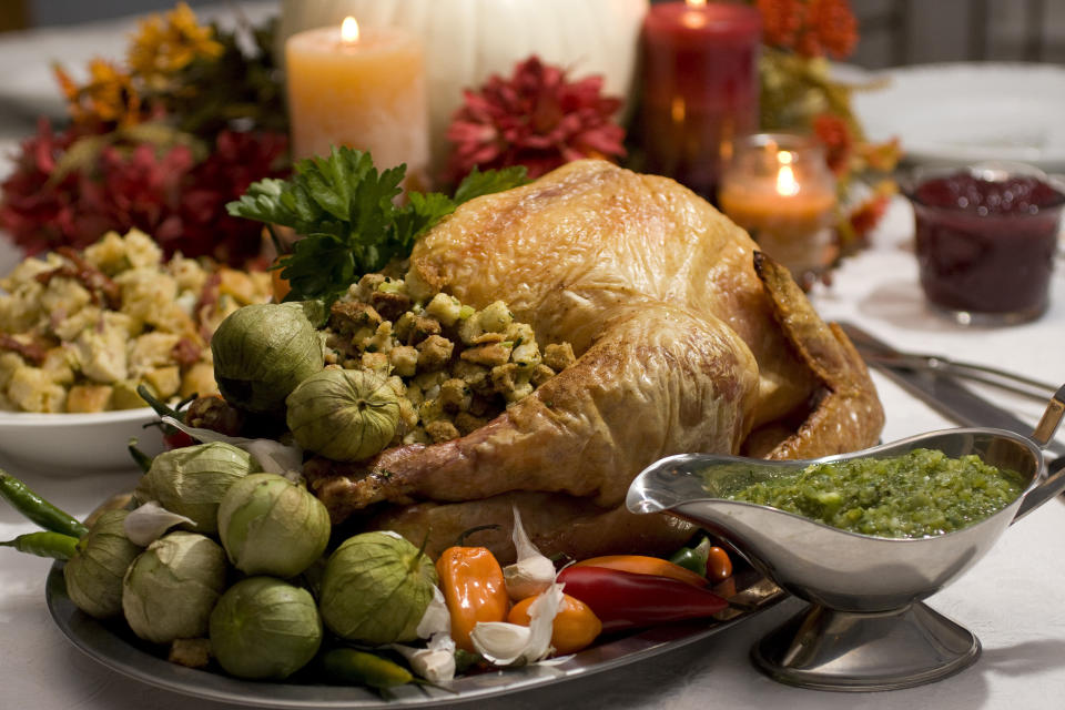 Asda  FILE - A grill-roasted brined turkey is presented on a table in Concord, N.H. Turkey is the center of most Thanksgiving meals, but it’s important to handle raw poultry properly to avoid spreading bacteria that can send your guests home with an unwanted side of food poisoning.  (AP Photo/Larry Crowe, File)