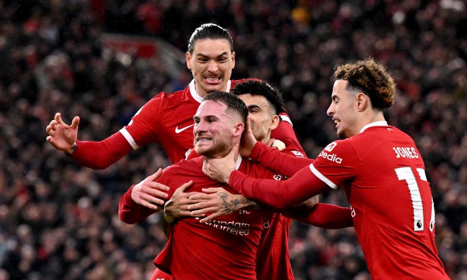 <span>Alexis Mac Allister is mobbed his his <a class="link " href="https://sports.yahoo.com/soccer/teams/liverpool/" data-i13n="sec:content-canvas;subsec:anchor_text;elm:context_link" data-ylk="slk:Liverpool;sec:content-canvas;subsec:anchor_text;elm:context_link;itc:0">Liverpool</a> teammates after blasting away the doubts against Sheffield United.</span><span>Photograph: Andrew Powell/Liverpool FC/Getty Images</span>