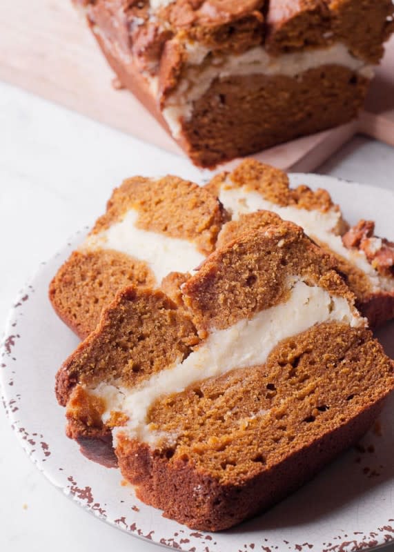 <p>What's In The Pan</p><p>Pumpkin bread with cream cheese filling is a combination of two desserts: pumpkin bread and cheesecake! The pumpkin bread is lightly sweet with a moist and rich cream cheese filling inside. </p><p><strong>Get the recipe: <em><a href="https://whatsinthepan.com/pumpkin-bread-with-cream-cheese-filling/" rel="nofollow noopener" target="_blank" data-ylk="slk:Pumpkin Bread with Cream Cheese Filling;elm:context_link;itc:0;sec:content-canvas" class="link ">Pumpkin Bread with Cream Cheese Filling</a></em></strong></p><p><strong>Related: 19 <a href="https://parade.com/845789/kavitharamaswamy/19-better-pumpkin-bread-recipes/" rel="nofollow noopener" target="_blank" data-ylk="slk:Better Pumpkin Bread Recipes;elm:context_link;itc:0;sec:content-canvas" class="link ">Better Pumpkin Bread Recipes</a></strong></p>