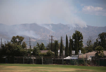 The La Tuna Canyon fire over Burbank, California, September 2, 2017. REUTERS/Kyle Grillot