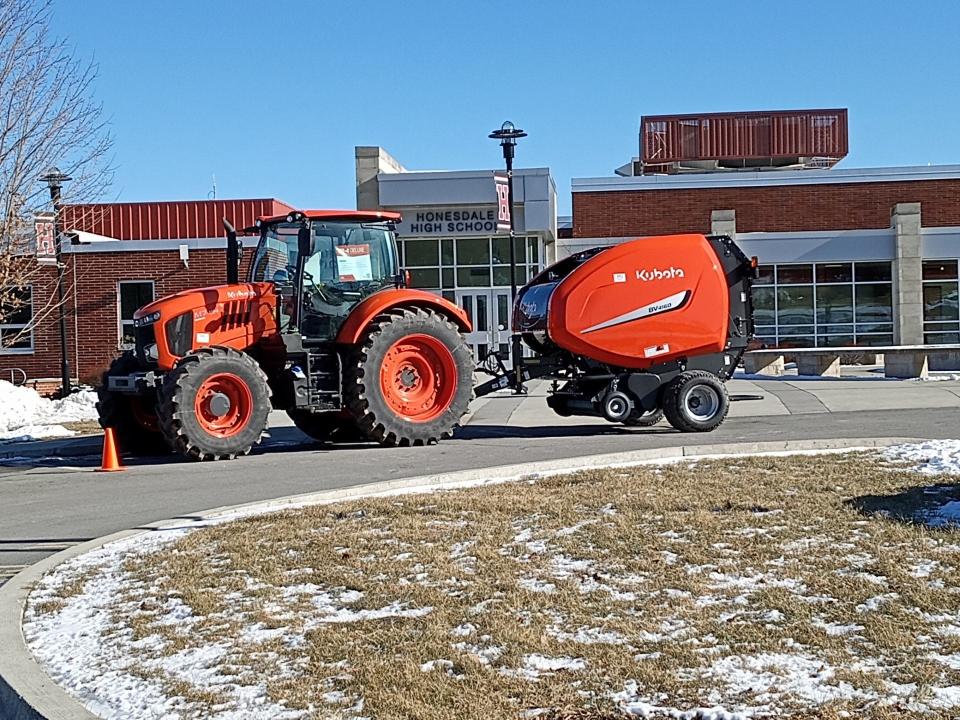 A farm tractor was parked in front of Honesdale High School on Feb. 12, 2024, for Wayne County Ag Day being hosted by Penn State Extension at the school. Among the many exhibitors was the high school's Agricultural Program and FFA chapter.