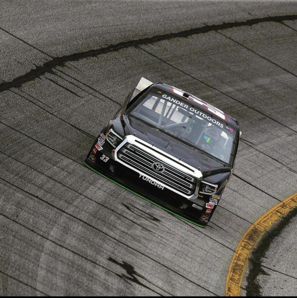 Devon Rouse of Burlington turns a lap in a NASCAR truck in Charlotte, North Carolina.