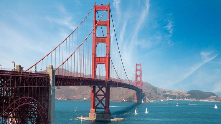 The Golden Gate Bridge in San Francisco took 4 years and 5 months to construct.  Work began on Jan. 5, 1933 and was completed on May 28, 1937. The bridge spans 8,981 feet.