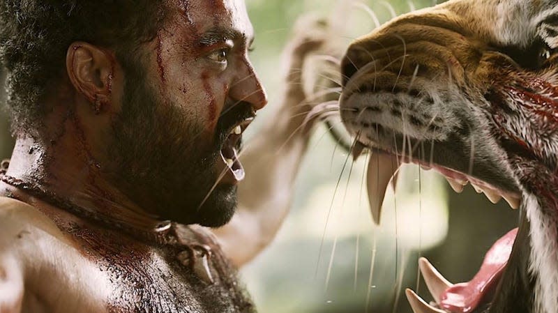 Bheem facing off with a tiger.