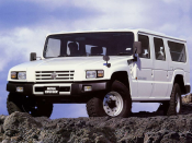 <p>Then there's the Mega Cruiser. It's a Hummer lookalike only sold in Japan, powered by a diesel inline-four. It's just as capable as the Hummer off-road—perhaps even more so, thanks to four-wheel steering, a feature never offered on the Hummer.</p>