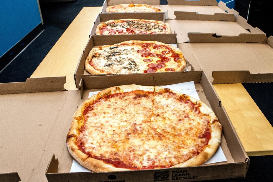 From left, finalists, Cafe Napoli's cheese and mushroom and pepperoni pies; and Margarita's mushroom and pepperoni and cheese pies are featured during the Delaware's Favorite Pizza Challenge bracket finals held in the News Journal's newsroom in New Castle, Monday, March 27, 2023.