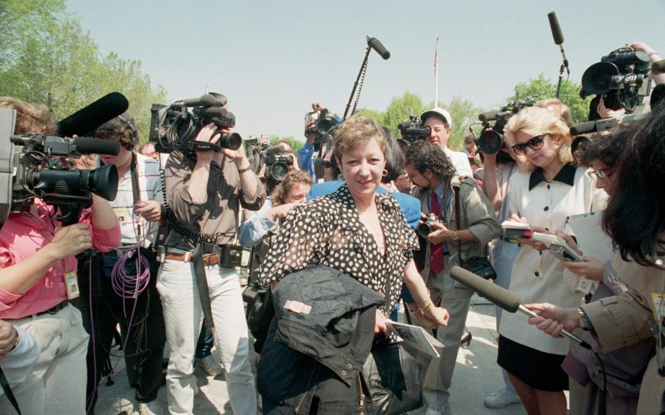 Norma McCorvey in front of Supreme Court steps talking to the press in 1989 - Bettmann