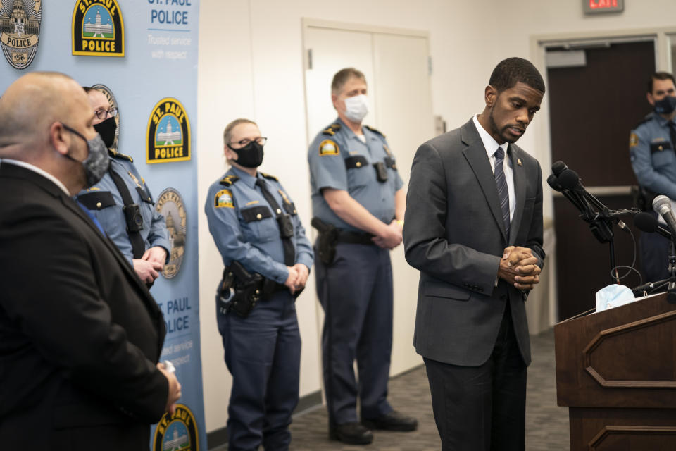 St. Paul Mayor Melvin Carter thanked Chief Todd Axtell for his transparency at a press conference about a shooting by a police officer last Saturday in St. Paul, Minn., on Tuesday, Dec. 1, 2020. (Renee Jones Schneider/Star Tribune via AP)