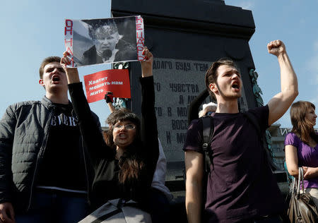 Opposition supporters shout during a protest ahead of President Vladimir Putin's inauguration ceremony, Moscow, Russia May 5, 2018. REUTERS/Tatyana Makeyeva