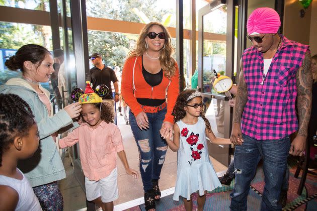 Mariah Carey and Nick Cannon arrive at their twins' birthday party at Disneyland in April 2017. (Photo: FilmMagic via Getty Images)