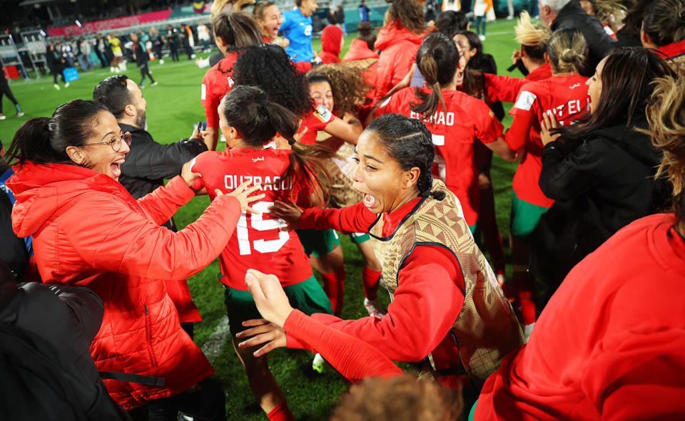 Morocco players celebrating at the Women's World Cup.