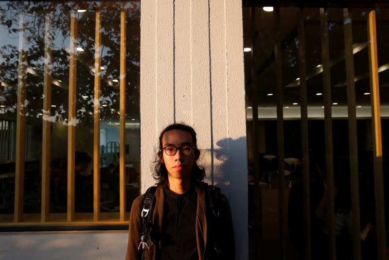 Derek Tai poses for photo at the campus of Chinese University of Hong Kong in Hong Kong