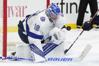 Tampa Bay Lightning goaltender Andrei Vasilevskiy blocks a shot against the Nashville Predators in the second period of an NHL hockey game Saturday, April 10, 2021, in Nashville, Tenn. (AP Photo/Mark Humphrey)