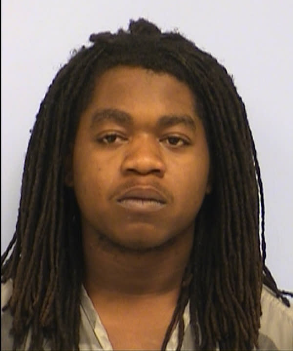 This undated photo provided by the Austin Police Department in Austin, Texas, shows Rashad Charjuan Owens. Owens, the driver who killed two people when he smashed his car through a barrier and into a street thronged with attendees of the South By Southwest festival, has been charged with capital murder. A district judge on Friday, March 14, 2014, set bail for Owens at $3 million. He remains jailed. (AP Photo/Austin Police Department)