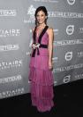 <p>Norah Weinstein, the president of Baby2Baby opted for a pink ruffled Gucci gown complete with a corsage and big black bow. <i>[Photo: Getty]</i> </p>