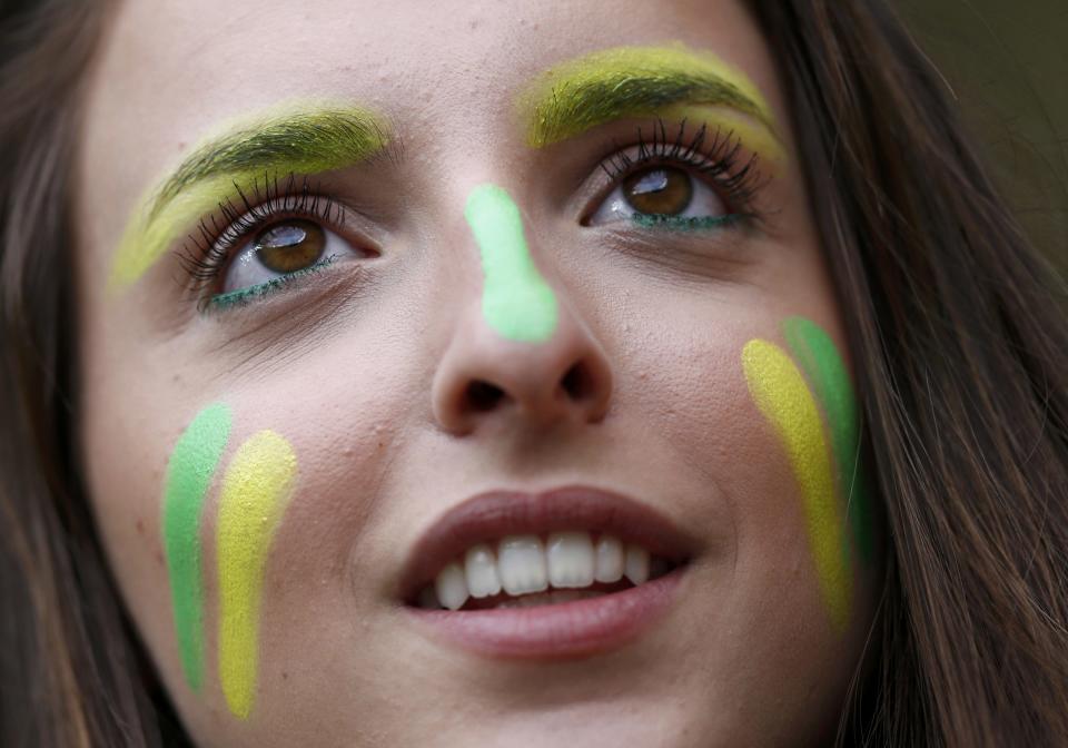 A fan waits for the start of the 2014 World Cup semi-finals between Brazil and Germany at the Mineirao stadium in Belo Horizonte