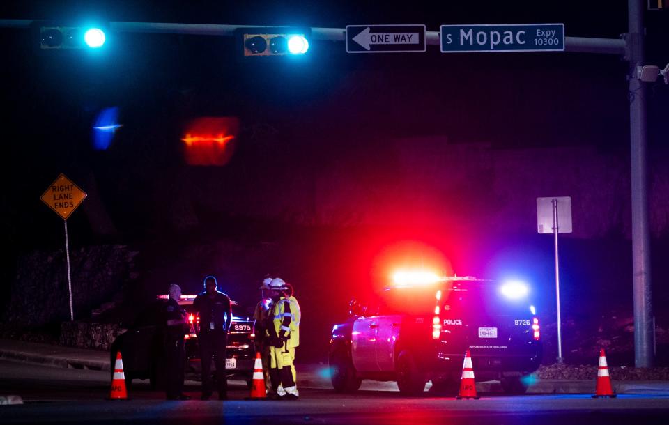 Austin Police officers close La Crosse Avenue near Mopac Expressway in Austin, Texas late Tuesday, Dec. 5, 2023. Texas (©Sara Diggins/American-Statesman)