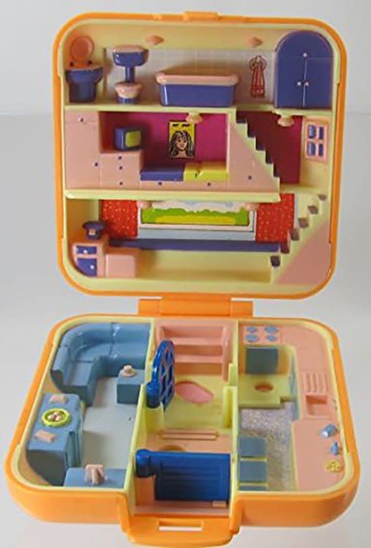 Opened Polly Pocket on display