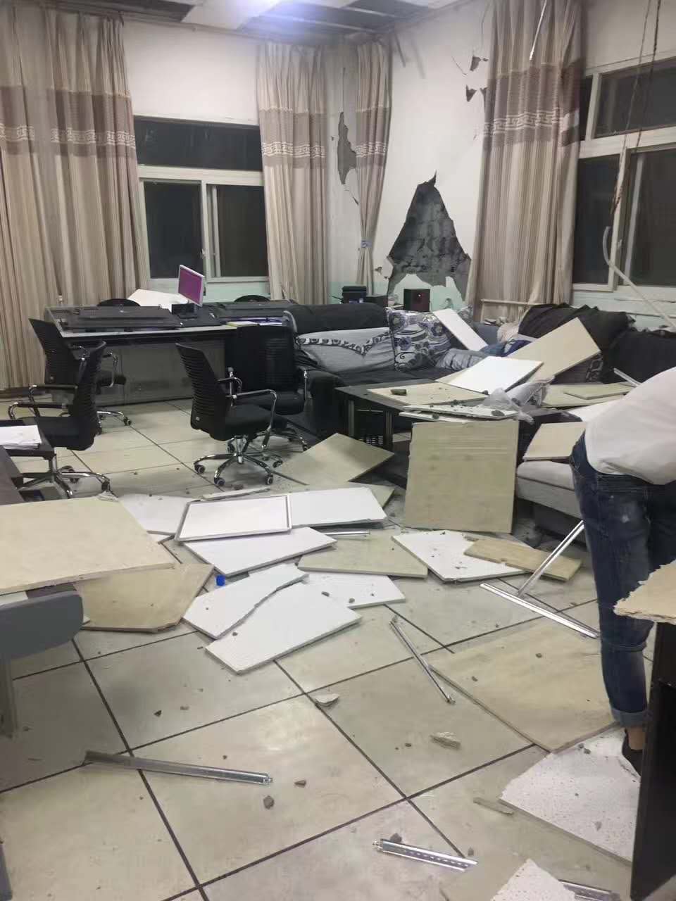 <p>Tiles fall off inside a house at Jiuzhaigou County on Aug. 9, 2017 in Tibetan and Qiang autonomous prefecture of Aba, Sichuan Province of China. A magnitude-7.0 earthquake struck Jiuzhaigou County at 9:19 pm on Tuesday. (Photo: VCG via Getty Images) </p>