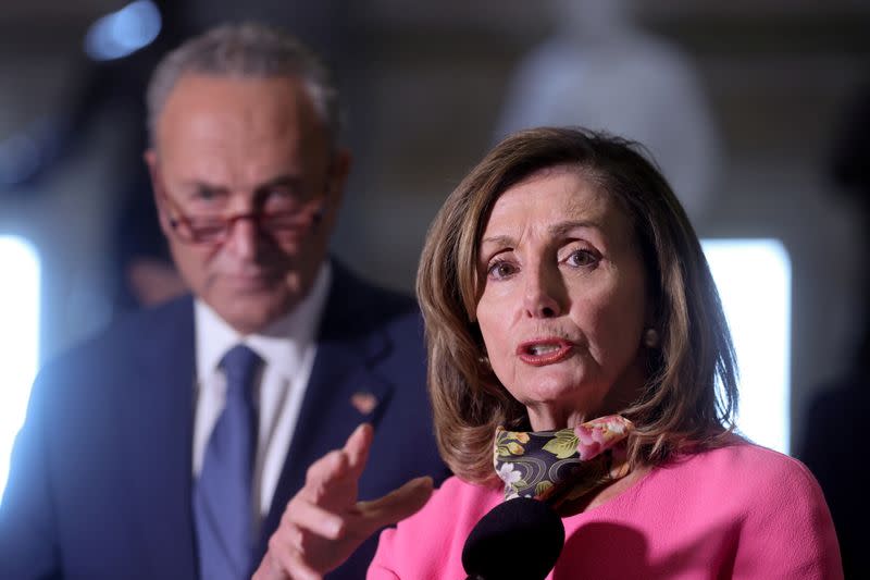 FILE PHOTO: U.S. House Speaker Pelosi and Senate Minority Leader Chuck Schumer (D-NY) speak to reporters after their coronavirus relief negotiations with Mnuchin and Meadows at the U.S. Capitol in Washington