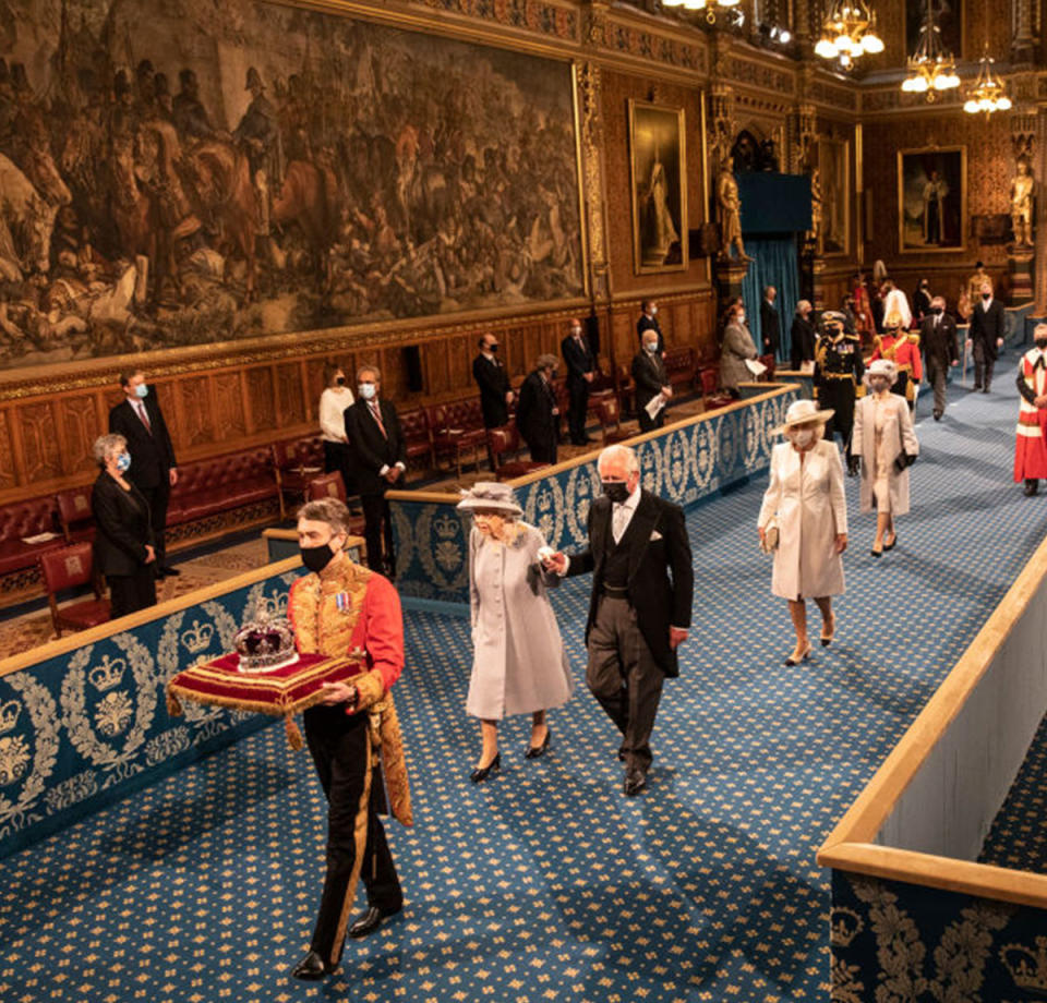 State Opening of Parliament 2021, showing the royals walking in a straight line.