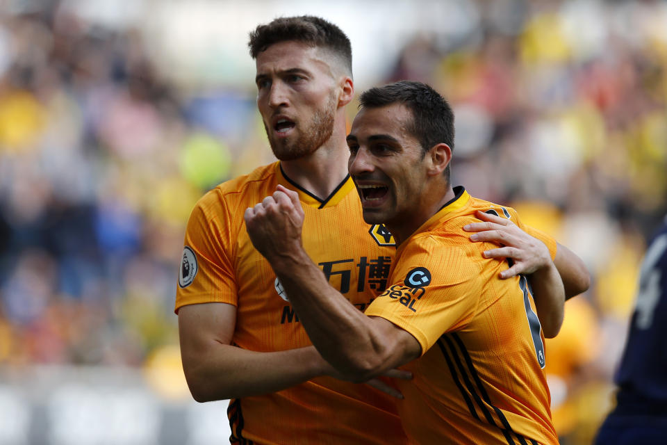WOLVERHAMPTON, ENGLAND - SEPTEMBER 28: Goalscorer Matt Doherty of Wolverhampton Wanderers celebrates with Jonny Castro Otto  during the Premier League match between Wolverhampton Wanderers and Watford FC at Molineux on September 28, 2019 in Wolverhampton, United Kingdom. (Photo by Malcolm Couzens/Getty Images)