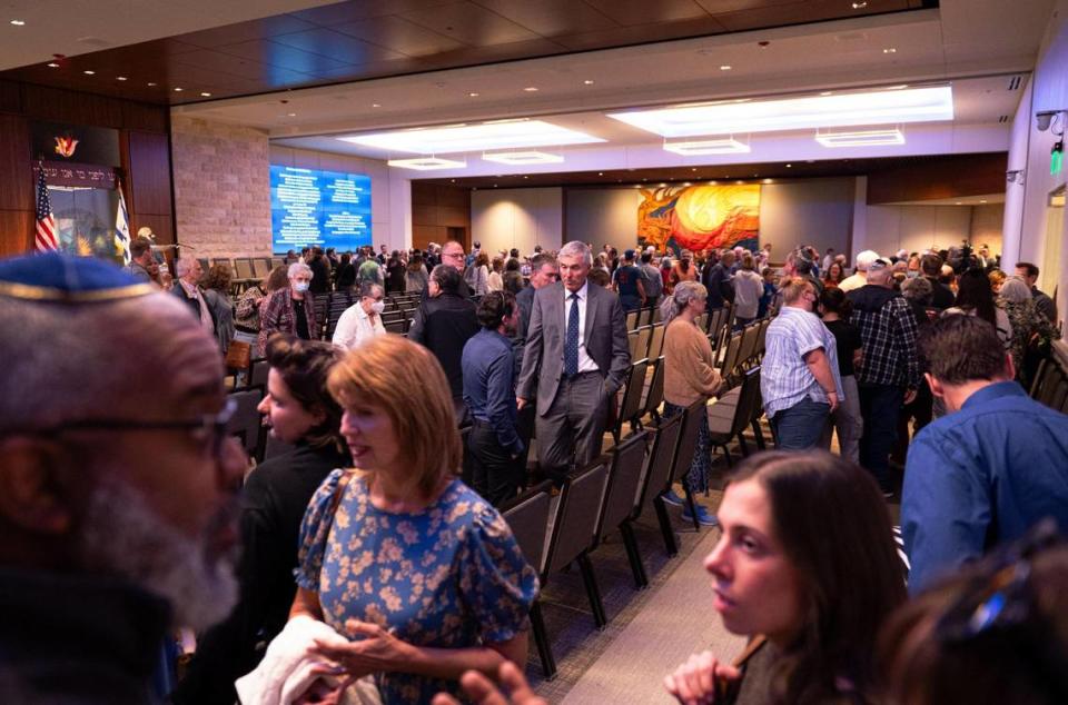 Congregants gather after a ceremony in support of Israel on Monday, Oct. 9, 2023, at The Temple, Congregation B’nai Jehudah in Overland Park. The event was held to show support for the global Jewish community and citizens of Israel after recent attacks by Hamas.