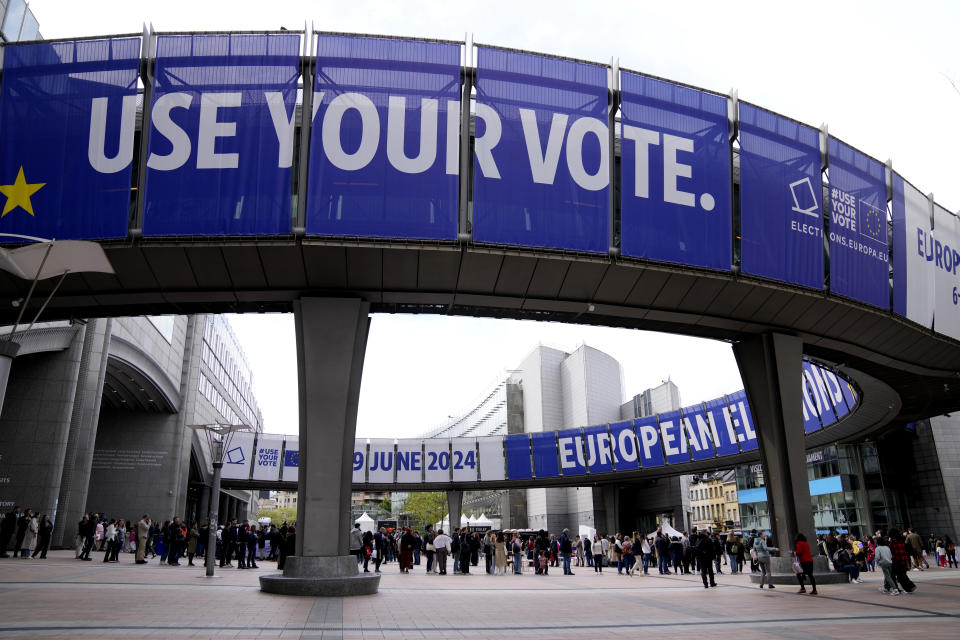 FILE - People wait in line to visit the European Parliament during Europe Day celebrations in Brussels on May 4, 2024. The European Union marks Europe Day on Thursday, May 9, but instead of the traditionally muted celebrations, all eyes are on the EU elections in one month time which portend a steep rise of the extreme right and a possible move away from its global trendsetting climate policies. (AP Photo/Virginia Mayo, File)