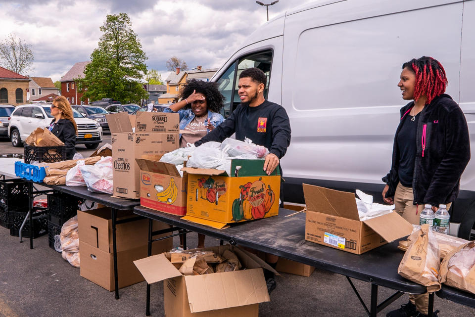 Volunteers with Candles in the S.U.N. distribute food in Buffalo, N.Y. (Courtesy Akil Kirkland)