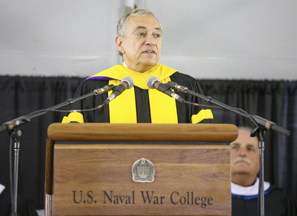 Acting President of the U.S. Naval War College Dr. Lewis Duncan addresses the graduates during the U.S. Naval War College's commencement ceremony, Friday, June 14, 2019, in Newport, R.I. (AP Photo/Stew Milne)