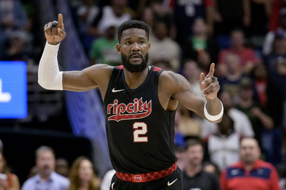 Portland Trail Blazers center Deandre Ayton celebrates a score against the New Orleans Pelicans during the first half of an NBA basketball game in New Orleans, Saturday, March 16, 2024. (AP Photo/Matthew Hinton)