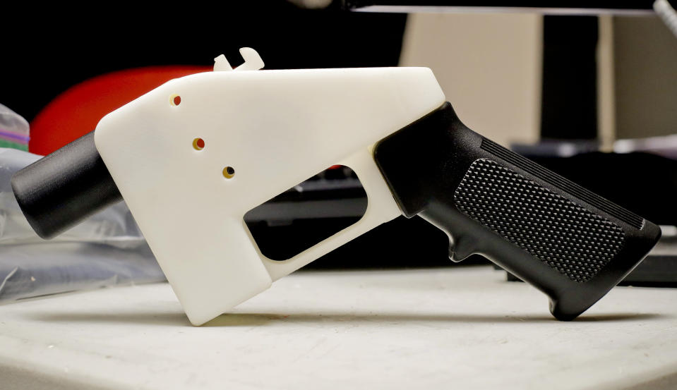 FILE- This Aug. 1, 2018 file photo, shows a 3D printed gun called the Liberator, in Austin, Texas. Attorneys general in 20 states and the District of Columbia have filed a lawsuit challenging a federal regulation that could allow blueprints for making guns on 3D printers to be posted on the internet. New York Attorney General Tish James is helping to lead the coalition, which filed the lawsuit Thursday. (AP Photo/Eric Gay, File)