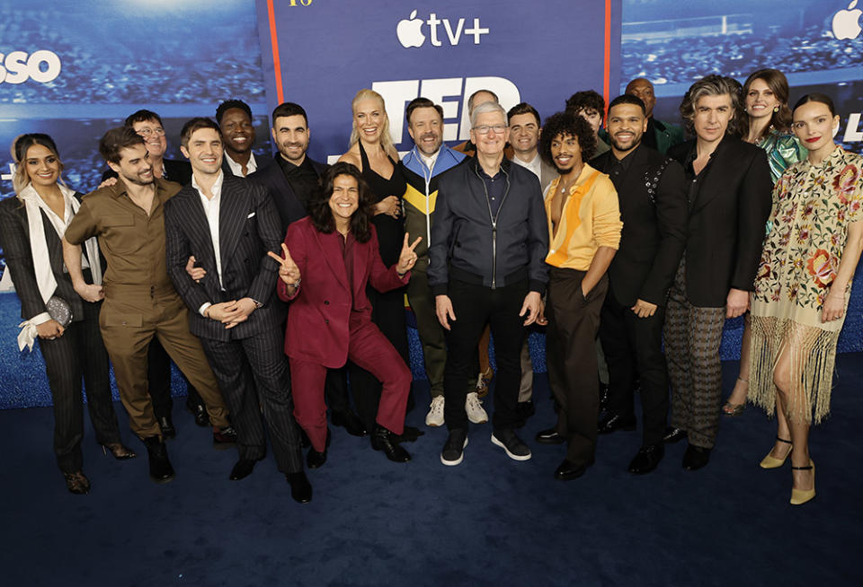 (L-R) Ambreen Razia, Stephen Manas, Jeremy Swift, Phil Dunster, Toheeb Jimoh, Brett Goldstein, Cristo Fernández, Hannah Waddingham, Jason Sudeikis, Tim Cook, Billy Harris, Moe Hashim, Charlie Hisock, Kola Bokinni, Moe Jeudy-Lamour, James Lance, Ellie Taylor and Jodi Balfour attend Apple Original Series "Ted Lasso" Season 3 Red Carpet Premiere Event at Westwood Village Theater on March 07, 2023 in Los Angeles, California.