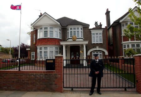 FILE PHOTO - A policeman stands guard outside the newly-opened North Korean Embassy in west London, Britain April 30, 2003. REUTERS/Stephen Hird/File Photo TPX IMAGES OF THE DAY